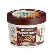 Jar of Garnier Ultimate Blends Hair Food Coconut with brown lid and white body.