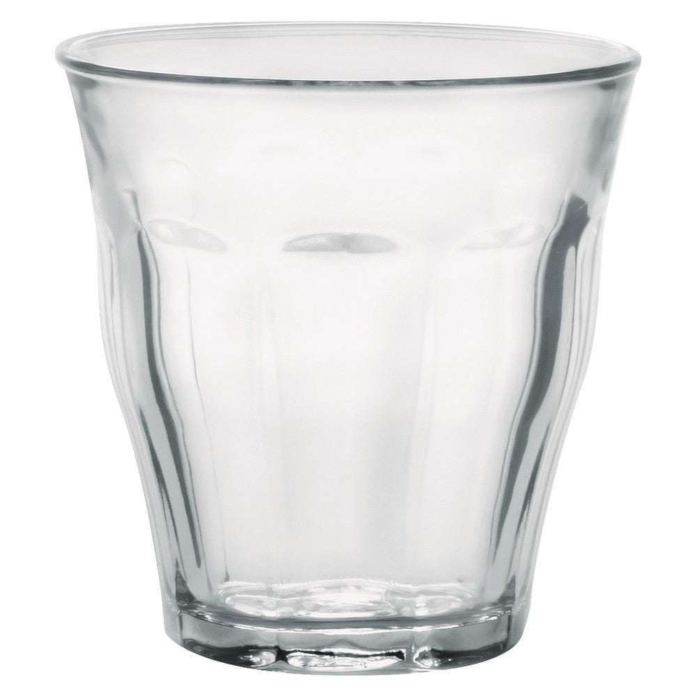 Clear glass tumbler on a white background